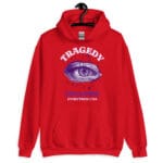 Tragedy Follows Unisex Hoodie with a bold, illustrated eye design on the front.