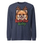 Cheerful Pomeranian puppy wearing reindeer antlers with Rein-fur Baby text on a long sleeve tee for dog moms and dads