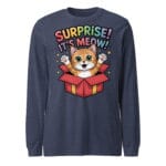 Cheerful kitten popping out of a gift box with Surprise It's Meow text on a long sleeve tee for cat moms and dads