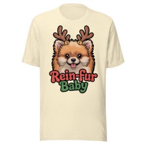 Cheerful Pomeranian puppy wearing reindeer antlers and jingle bells on a Rein-fur Baby t-shirt for dog moms and dads