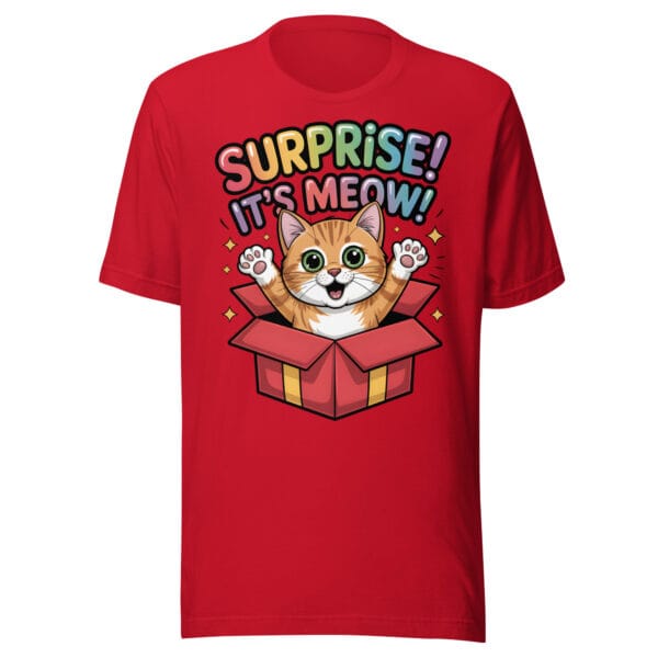 Cheerful kitten popping out of a gift box with Surprise It's Meow text on a t-shirt for cat moms and dads
